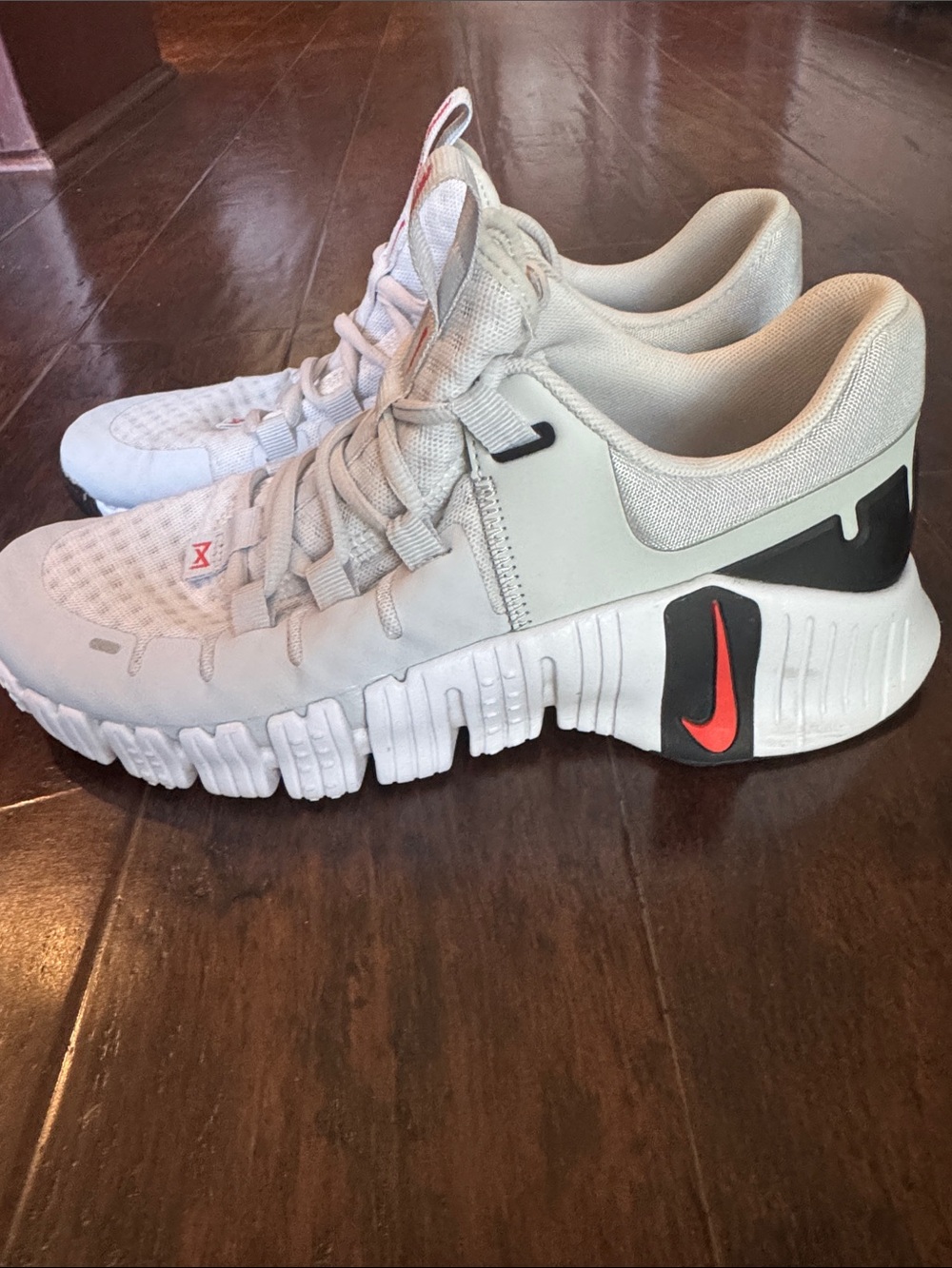 Nike Women’s Light Gray Athletic Sneakers with Coral Swoosh